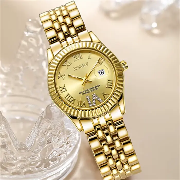 Montre XINEW à Quartz dorée avec calendrier complet pour femmes occasions spéciales
