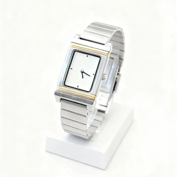 Cette montre à quartz Y2K est parfaite pour les couples. Il présente un boîtier rotatif double face 