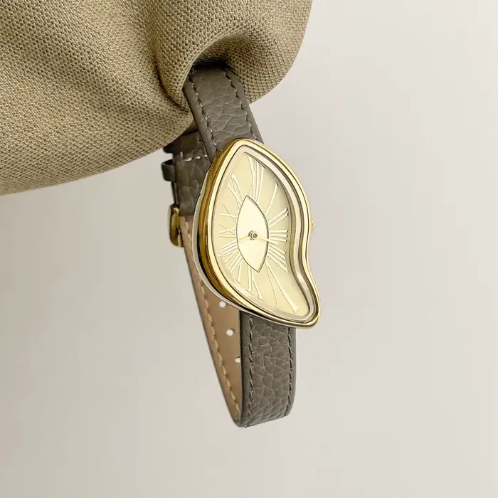 Montre créative rétro haut de gamme pour femmes, cadran torsadé irrégulier, montre à quartz en cuir 