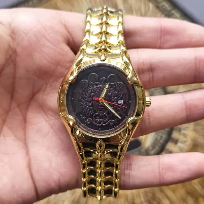 Montre-bracelet CILOA de luxe en or avec chaîne serpent
