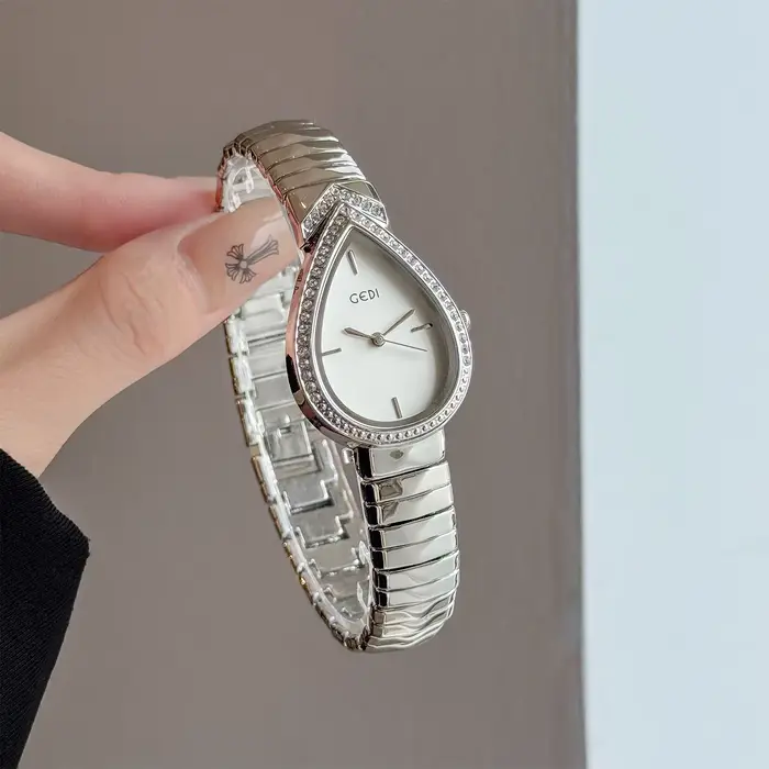 GEDI Nouvelle montre créative vintage pour femme avec cadran en forme de larme clouté de diamants