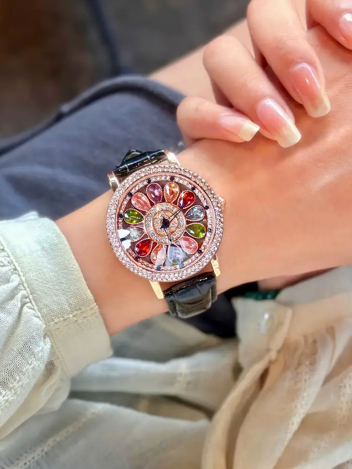 Une montre pour femme de luxe éblouissante et élégante, une montre à quartz sertie de strass colorés