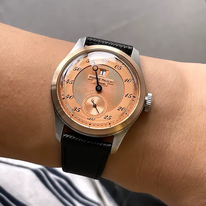 Montre Merkur en acier inoxydable avec anneau en bronze vintage cadran saumon pour hommes occasions spéciales