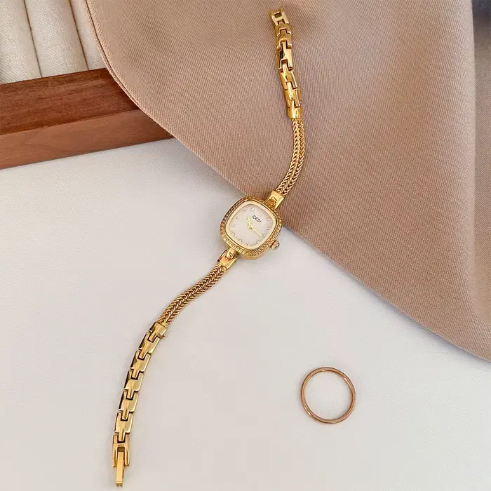 Montre GEDI Or Élégante 2026 pour Femme Style Vintage Bracelet Métal Quartz Occasions Spéciales