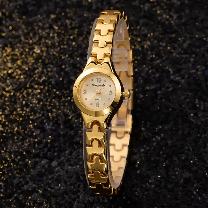 Top marque femmes montre de luxe Bracelet en or montres Quartz montre-Bracelet pour femme mode éléga