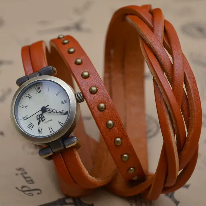 Shsby nouveau Roma Vintage peau de vache spirale plaie bracelet chiffres romains tissage tresse montre femmes