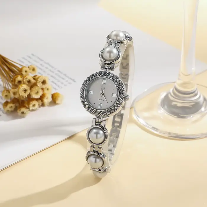 Nouvelle Montre Bracelet Élégante en Perles pour Femme