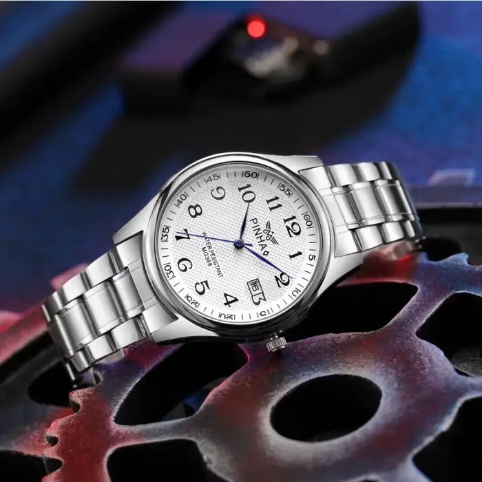 Montre en acier inoxydable XUNCHELL Quartz pour homme style casual et fashion occasions spéciales
