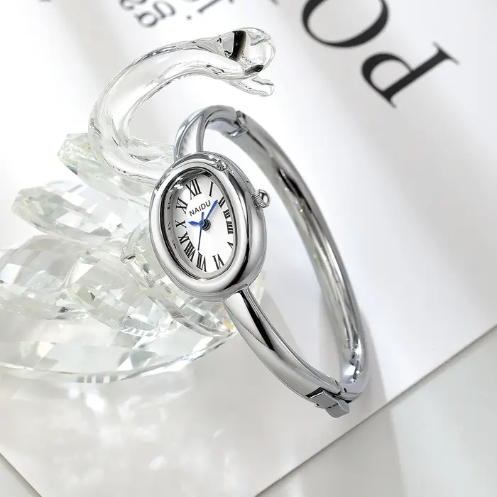 Montre pour femme décontractée, polyvalente, simple et à la mode avec affichage à l'échelle romaine