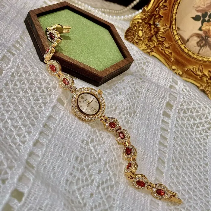 1 montre pour femme élégante et rétro, de luxe léger, sertie de strass et de pierres précieuses de t