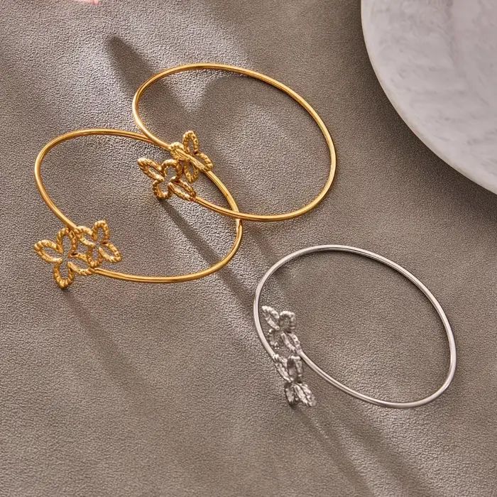 Bracelet manchette double fleur creuse plaqué or 18 carats pour femme
