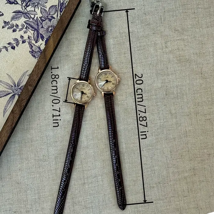 Cette montre pour femme avec bracelet en cuir couleur café de style vintage est décontractée et élégante