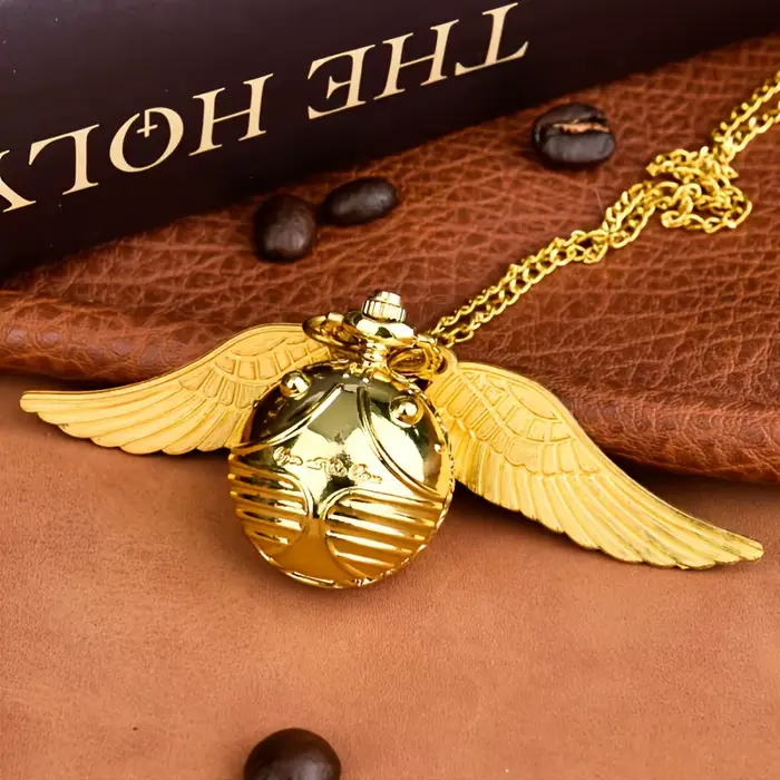 Montre de poche luxueuse avec ailes dorées et citrouille pour homme, élégante et innovante, idéale pour les occasions formelles et informelles