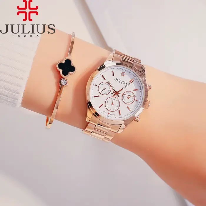 Montre multifonction quartz pour femmes élégante résistante à l'eau avec affichage date et jour pour occasions sportives et professionnelles