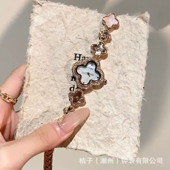 Nouvelle mode offre spéciale marque montre femmes montre à Quartz de luxe quatre feuilles herbe diam