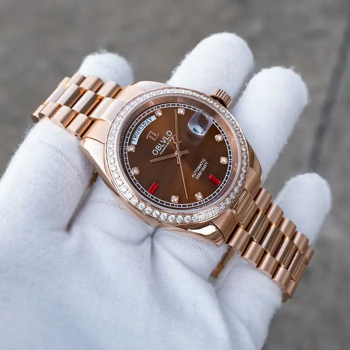 Montre automatique de luxe homme cadran marron bracelet or rose date avec résistance à l'eau et affichage lumineux pour occasions spéciales