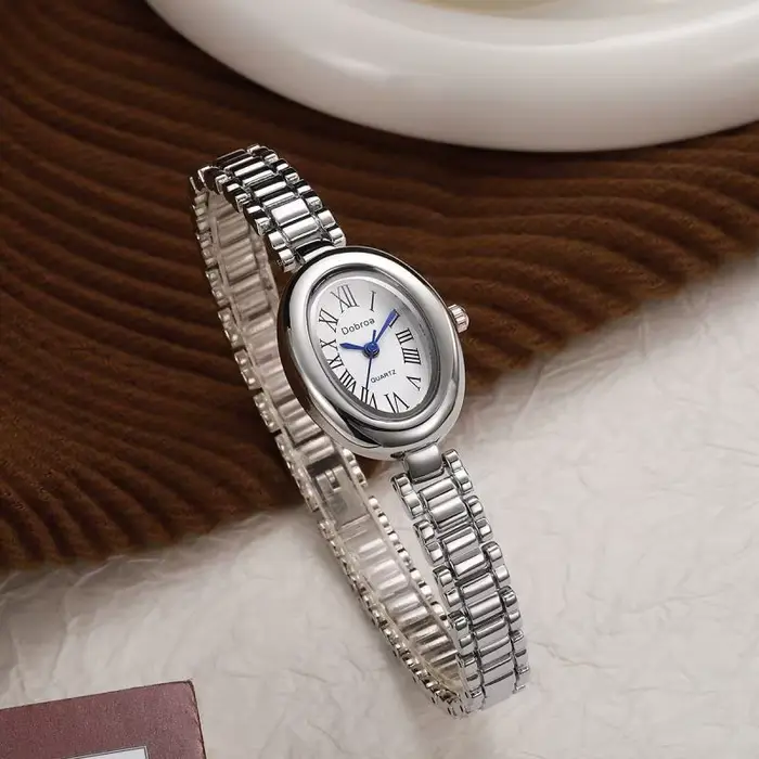 Montre femelle ceinture en acier haute beauté ovale baignoire quartz simple grosses montres bracelet occasions spéciales