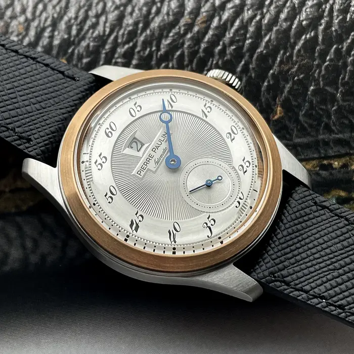 Montre Merkur en acier inoxydable avec anneau en bronze vintage cadran saumon pour hommes occasions spéciales