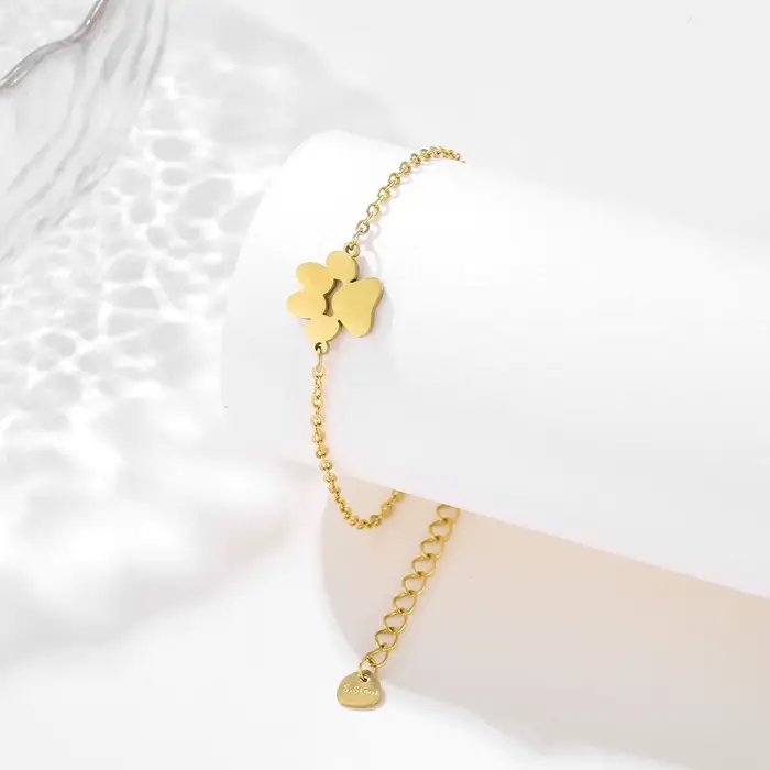 Bracelet à breloques en forme de patte de chien mignon pour femmes et hommes
