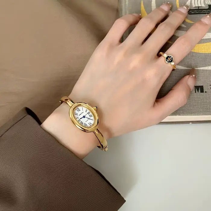 Montre de baignoire femmes haut de gamme or Rose lumière luxe rond Bracelet en métal montres dames mode Quartz