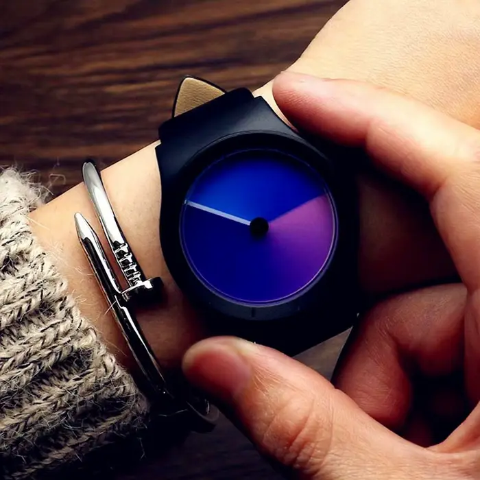 Montre à quartz en cuir véritable pour hommes et femmes