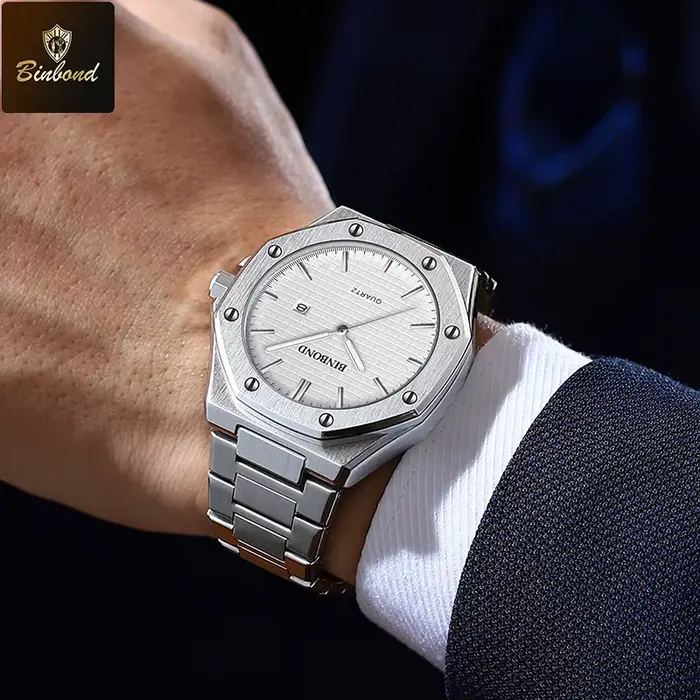 BINBOND chaud nouveau homme montre bracelet en alliage avec vis octogonale anneau décoratif mouvement à Quartz haut de