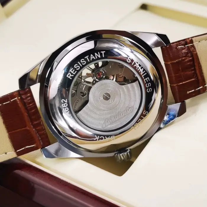 Montre mécanique AOKULASIC avec tourbillon, résistance aux chocs et affichage lumineux pour homme, cuir et acier inoxydable, parfait pour occasions spéciales et quotidien