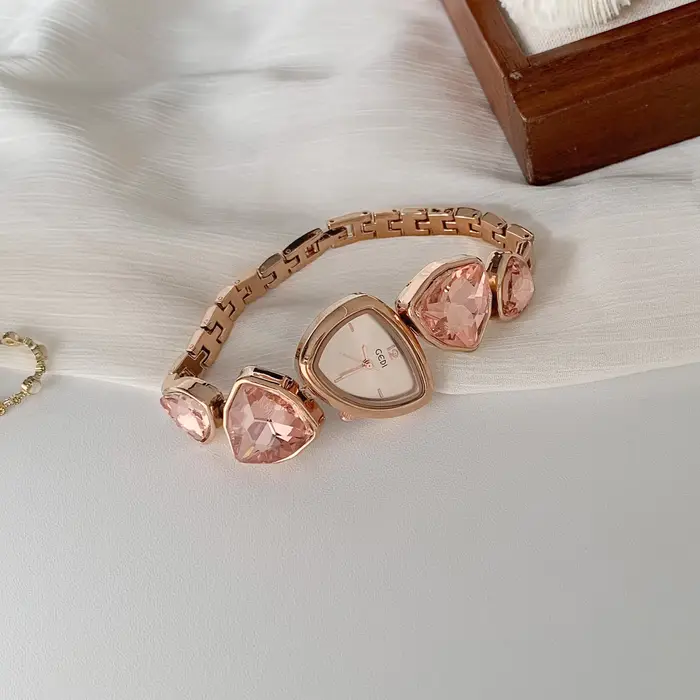 Montre à quartz rose pour femmes, cadran de forme irrégulière, légère, de luxe, tempérament, bracele