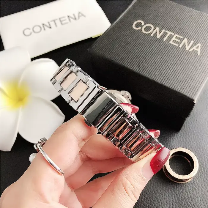 Montre TINUORA en acier inoxydable élégante avec affichage de calendrier pour femmes occasions spéciales
