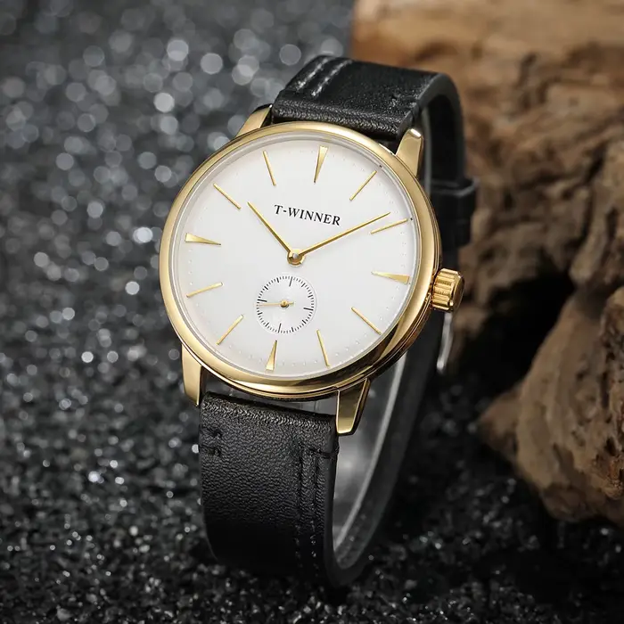 Montre mécanique T-Winner élégante pour homme résistante à l'eau avec ventilation manuelle et design luxueux pour diverses occasions