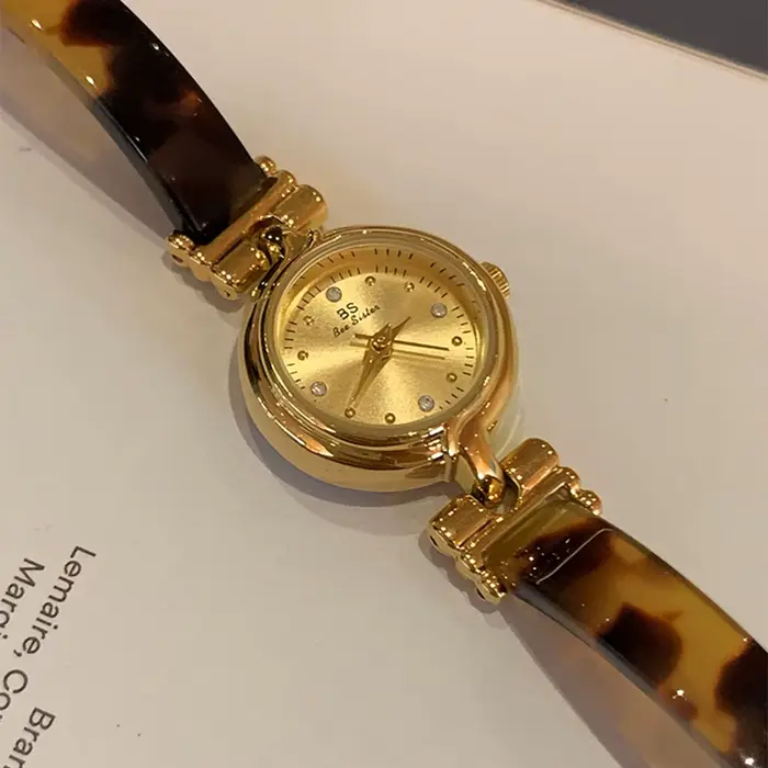 Montre féminine BS bee sister en résine imitation écorce de tortue dorée avec mouvement quartz pour occasions élégantes et quotidiennes