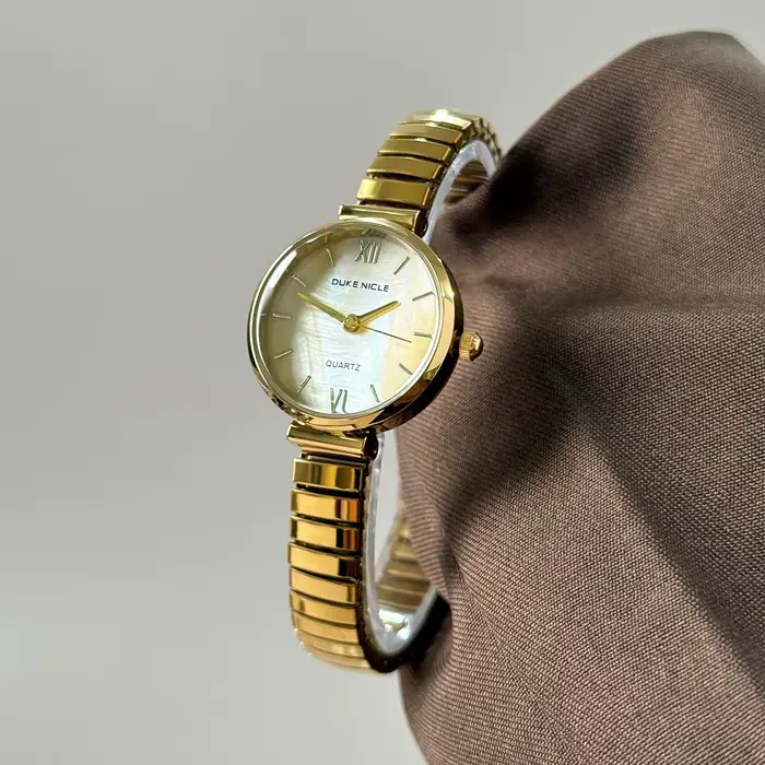Montre pour femme DUKE NICLE avec cadran rond, bracelet à ressort rétractable exquis, montre à quart