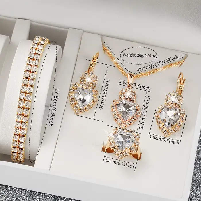 Montre à quartz sertie de diamants pour femme bracelet en acier doré élégante pour toutes les occasions style fashion casual