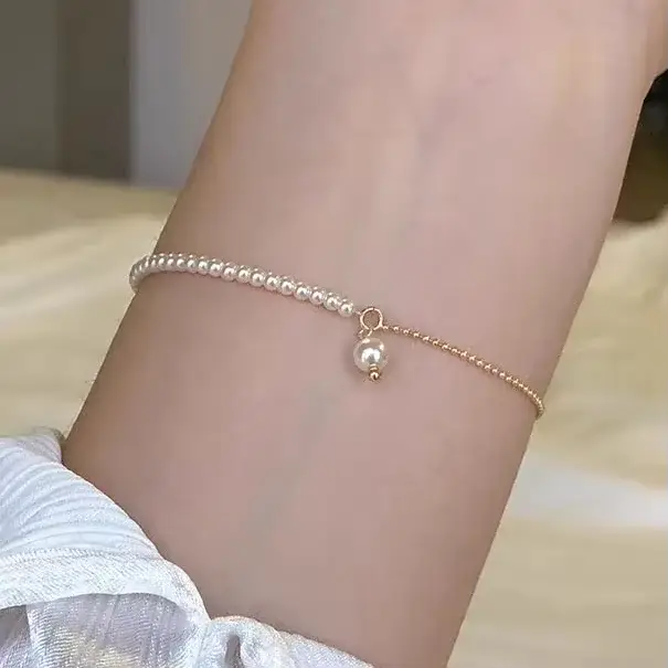 Bracelets à breloques ronds en perles dorées pour femmes