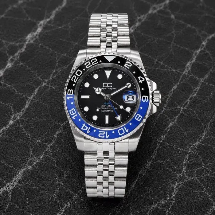 Montre homme Dwayne Campbell acier inoxydable 316L avec mouvement GMT et tourbillon résistante à l'eau pour occasions formelles et quotidiennes