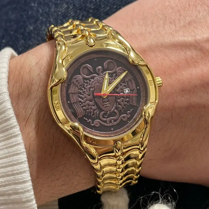 Montre-bracelet CILOA de luxe en or avec chaîne serpent