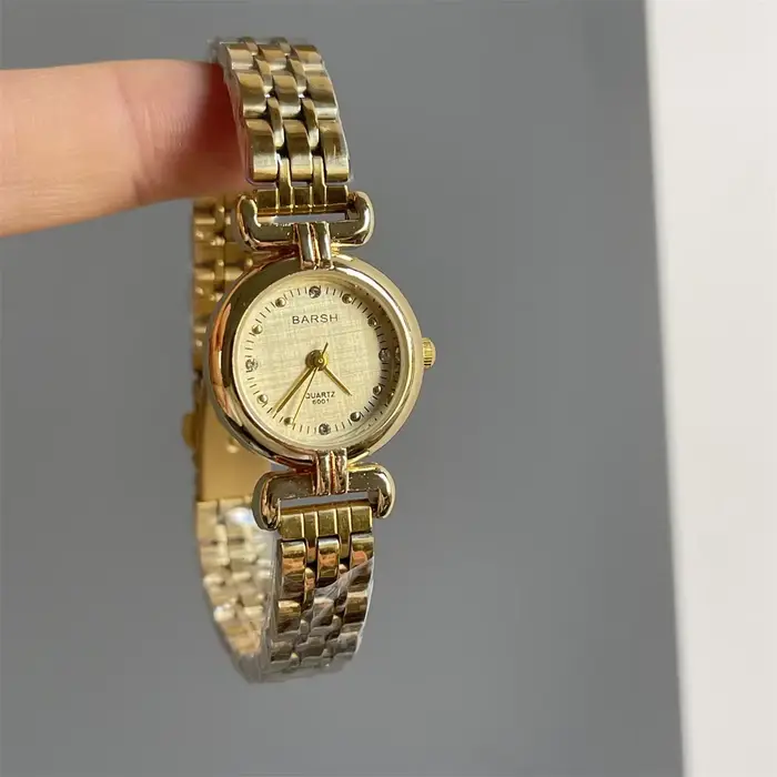 Marque femmes montre mode petit cadran montre en or de luxe bracelet en acier inoxydable montres à Q
