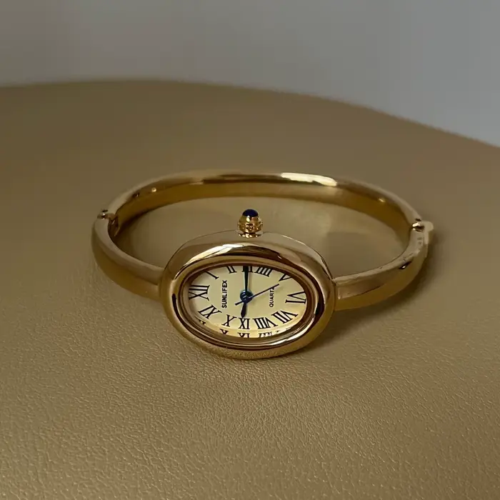Montre de baignoire femmes haut de gamme or Rose lumière luxe rond Bracelet en métal montres dames m