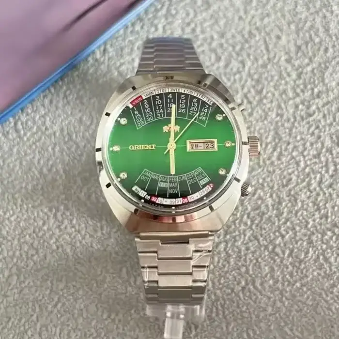 Montre automatique mécanique unisexe Orient 118A avec grand cadran rotatif