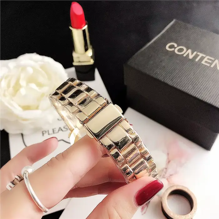 Montre en acier inoxydable JBAILI or rose élégante pour femmes occasions spéciales quartz mouvement fermoir de bracelet
