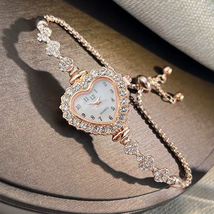 Nouvelles montres à Quartz en acier inoxydable montre en forme de coeur avec Bracelet réglable femmes montre-Bracelet décoration de poignet exquise