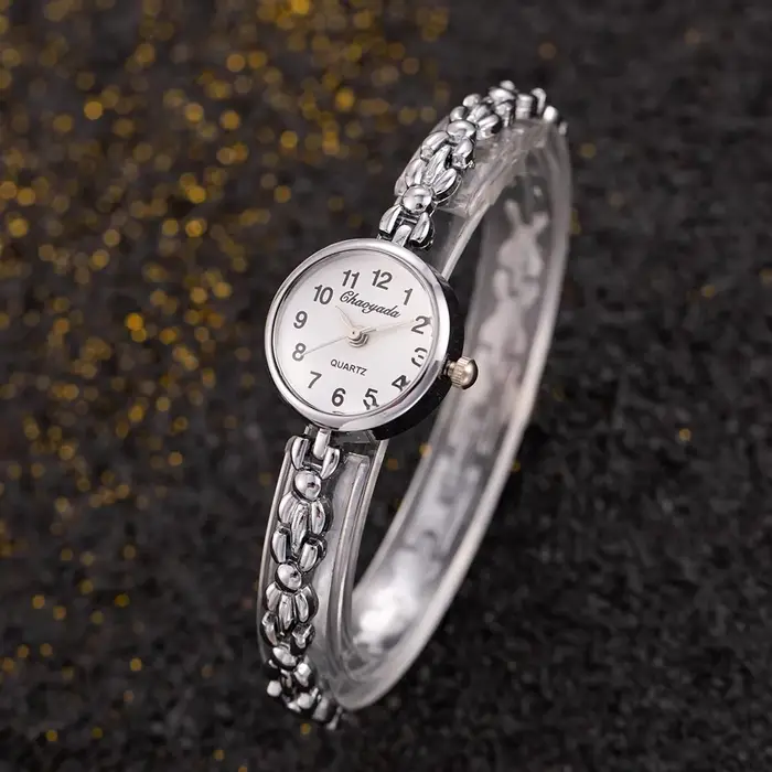 Montre TINUORA Femme Luxe Alliage Doré Élégante Quartz Occasions Spéciales