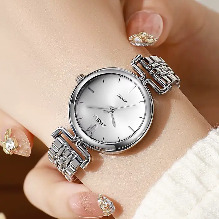 Montre élégante pour femme avec bracelet en acier inoxydable, quartz, design simple et résistant aux chocs pour toutes les occasions