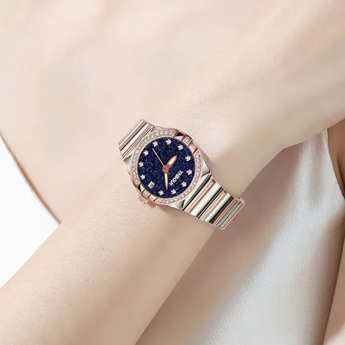 Montre élégante pour femme résistante à l'eau avec date et bracelet en acier inoxydable occasionnels et formels