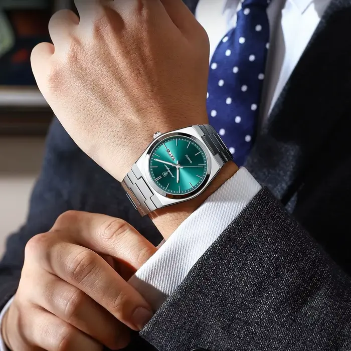 Montre en acier inoxydable POEDAGAR avec affichage de la date et de la semaine pour homme, résistante à l'eau, style décontracté et moderne