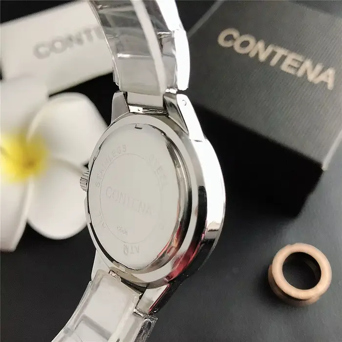Montre TINUORA en acier inoxydable élégante avec affichage de calendrier pour femmes occasions spéciales