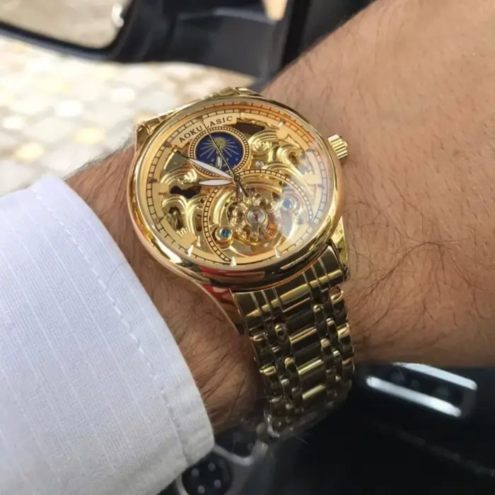 Montre automatique vintage en or homme phase de lune tourbillon squelette aiguilles lumineuses bracelet acier occassionnels spéciaux