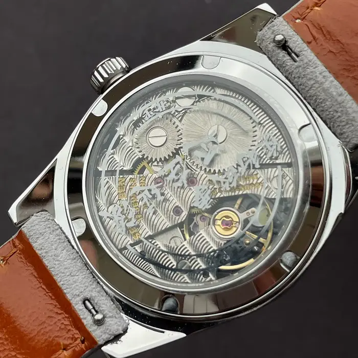 Montre MERKUR en acier inoxydable avec mouvement mécanique manuel pour hommes, résistante à l'eau, design vintage et bracelet en cuir pour diverses occasions