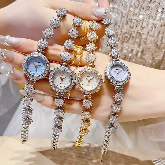 Montre luxueuse avec bracelet en acier inoxydable cadran violet pour femmes occasions spéciales quartz mouvement résistant à l'eau