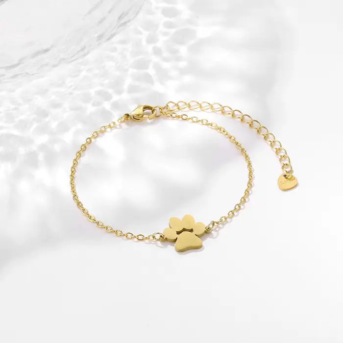 Bracelet à breloques en forme de patte de chien mignon pour femmes et hommes